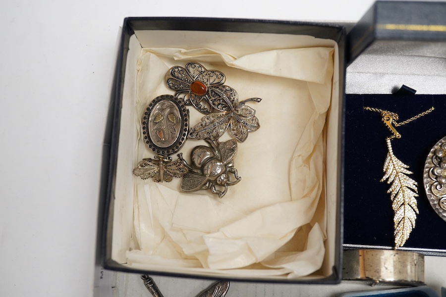 A quantity of assorted jewellery including costume, marcasite and white metal and an Edwardian silver child's rattle (a.f.). Condition - poor to fair to good